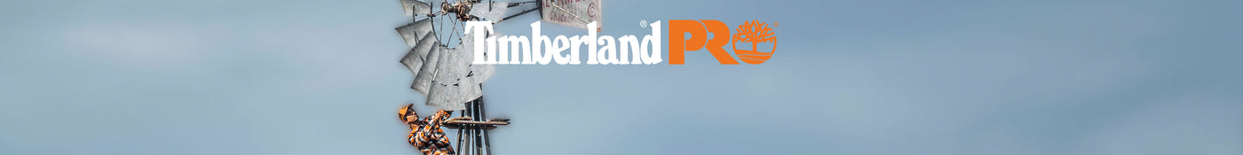 Timberland PRO logo on a blue sky background with construction tools and equipment.